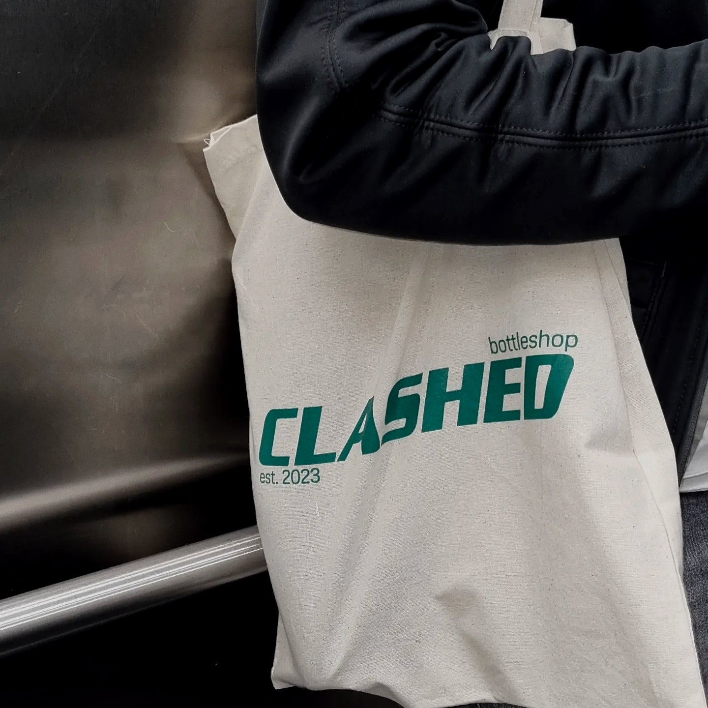 CLASHED tote bag